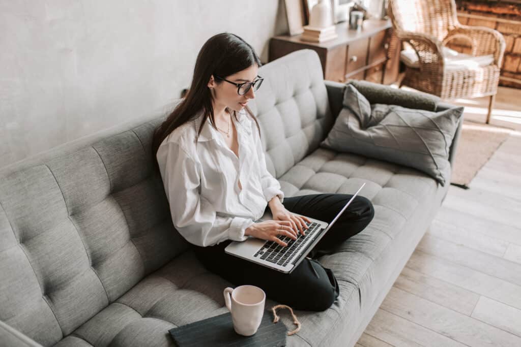 woman-networking-at-home-on-laptop