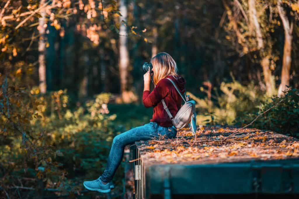 Girl taking photo of nature
