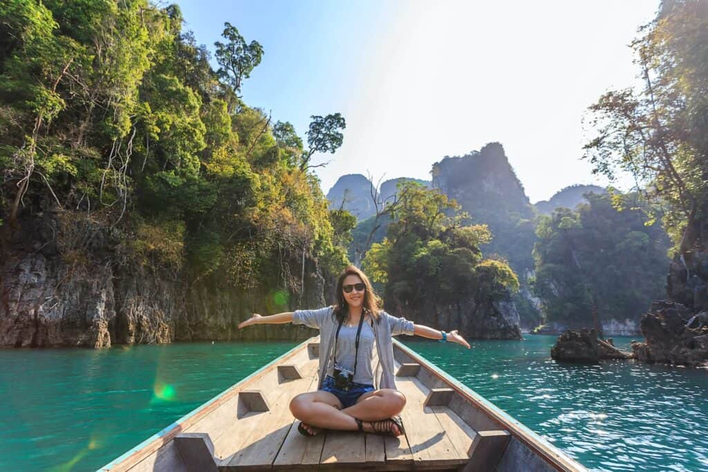Woman on boat in tropical paradise
